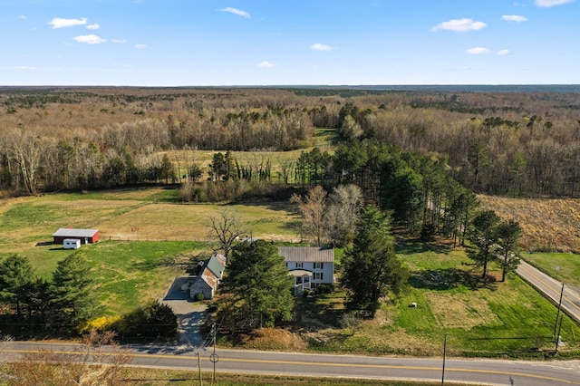 birds eye view of property featuring a rural view
