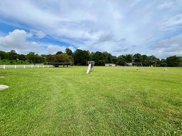 view of yard with a rural view