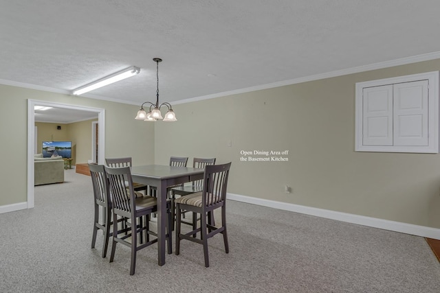 dining space featuring crown molding, a textured ceiling, and a chandelier