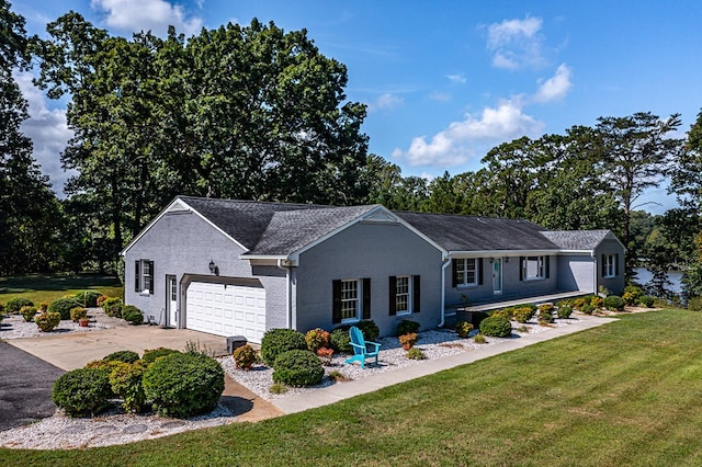 single story home with a garage and a front yard