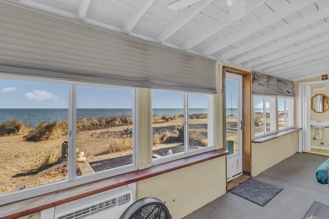 sunroom featuring vaulted ceiling, a water view, and wooden ceiling