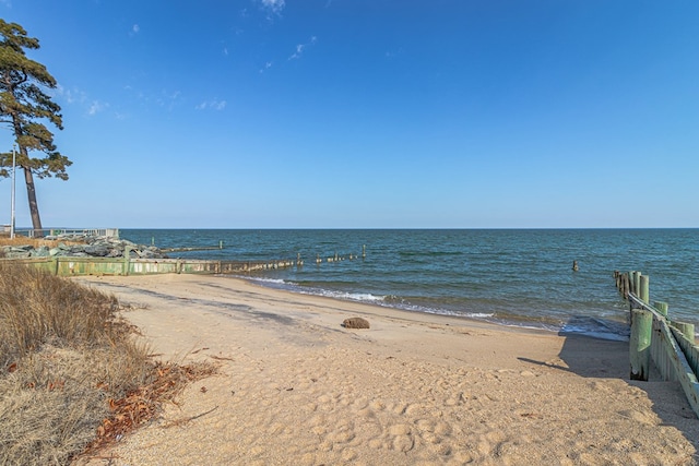 view of water feature with a beach view