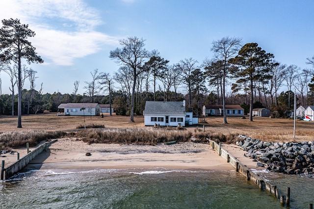 surrounding community featuring a water view