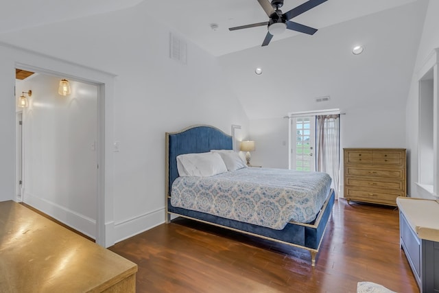 bedroom featuring ceiling fan, dark hardwood / wood-style floors, and vaulted ceiling