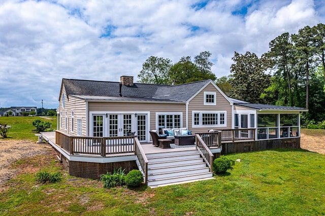 rear view of house featuring a lawn, an outdoor hangout area, and a wooden deck