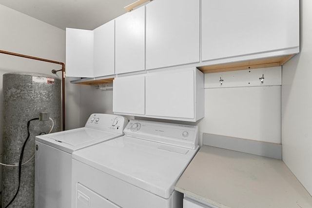 laundry area with cabinet space and washer and dryer