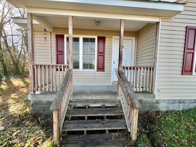 doorway to property with covered porch