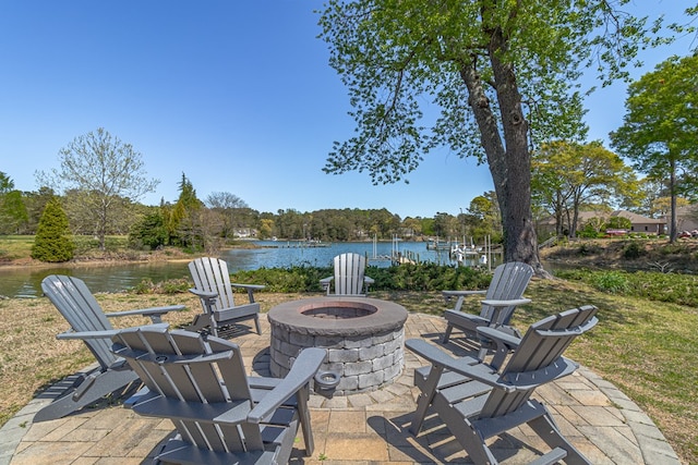 601 Cranes Creek Harbor Dr, Heathsville, VA 22473 - view of patio featuring an outdoor fire pit and a water view