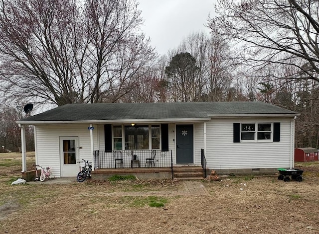 view of front facade with crawl space and a porch