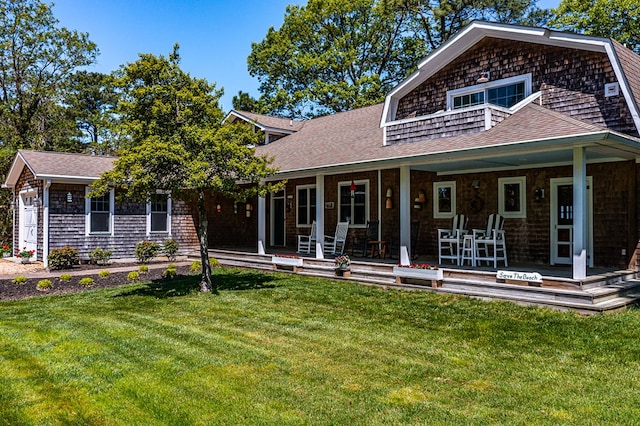 view of front of home with a front lawn and covered porch