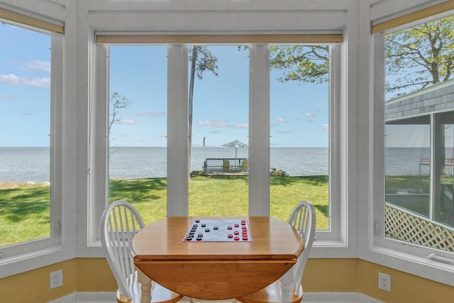 sunroom with a water view