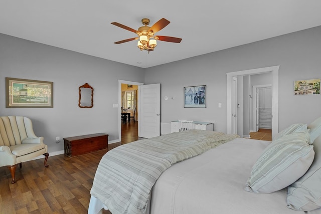 bedroom featuring dark hardwood / wood-style floors and ceiling fan