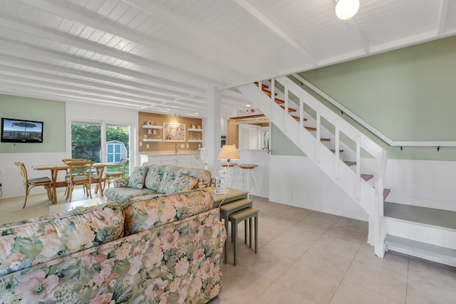 tiled living room featuring wood ceiling and beam ceiling