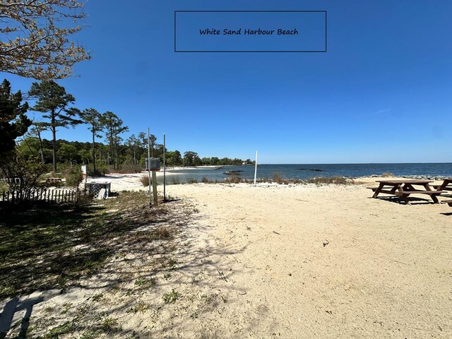 property view of water featuring a view of the beach