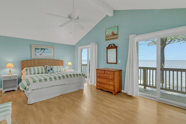 bedroom with a water view, lofted ceiling with beams, access to outside, ceiling fan, and light hardwood / wood-style floors