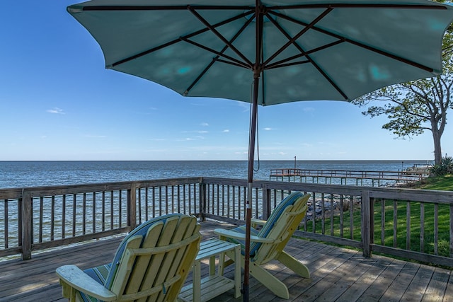 deck featuring a water view