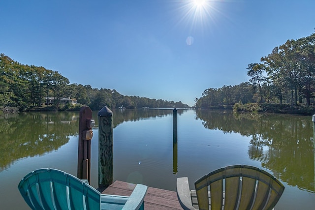 view of dock with a water view