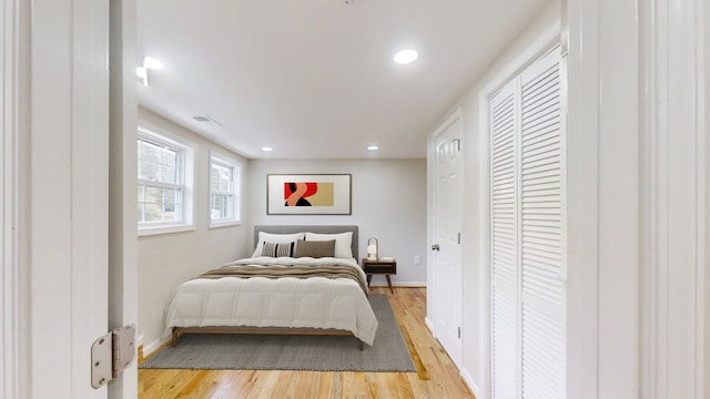 bedroom featuring light hardwood / wood-style flooring