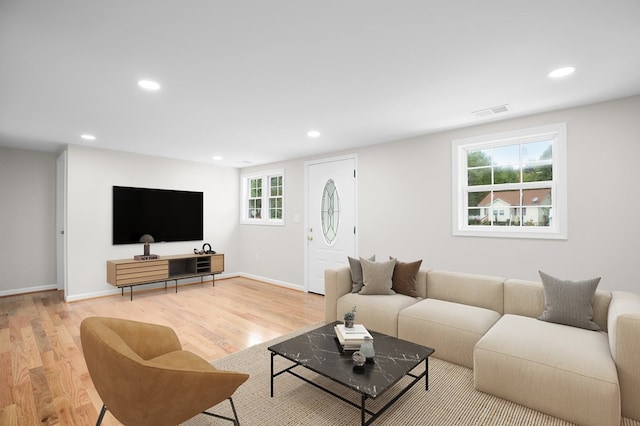 living room featuring light wood-type flooring