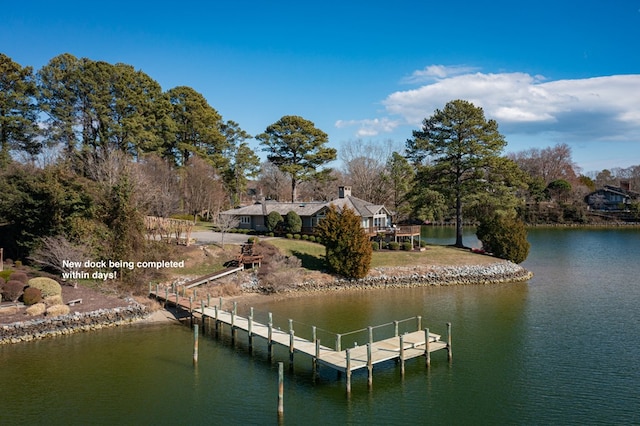 dock area featuring a water view