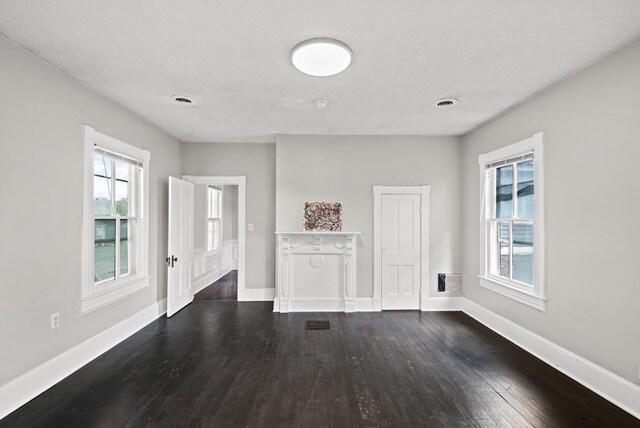 46 Yeocomico Ln, Kinsale, VA 22488 - unfurnished living room with dark wood-style floors and baseboards