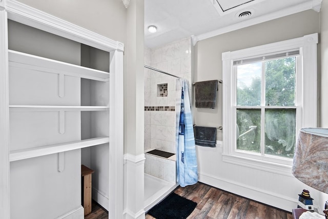 46 Yeocomico Ln, Kinsale, VA 22488 - bathroom with a stall shower, wood finished floors, and crown molding