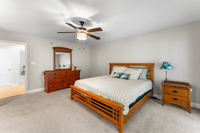 586 Kingscote Dr, Lottsburg, VA 22511 - carpeted bedroom with baseboards and a ceiling fan