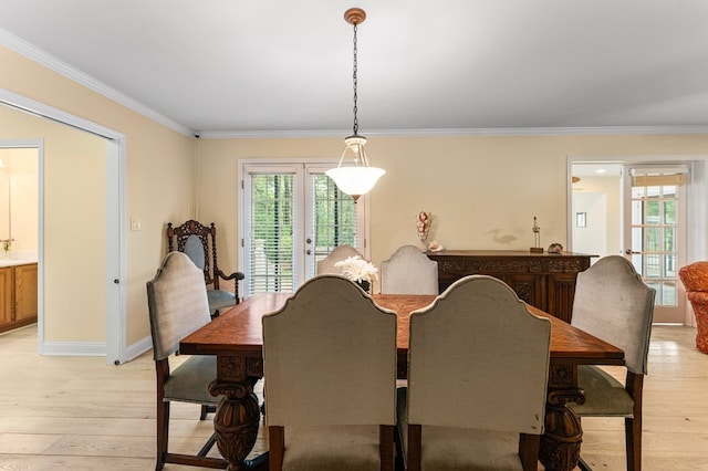 586 Kingscote Dr, Lottsburg, VA 22511 - dining area featuring light wood-style floors, ornamental molding, and baseboards