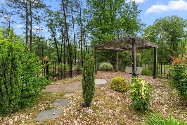 586 Kingscote Dr, Lottsburg, VA 22511 - view of yard featuring a pergola, a patio, and fence
