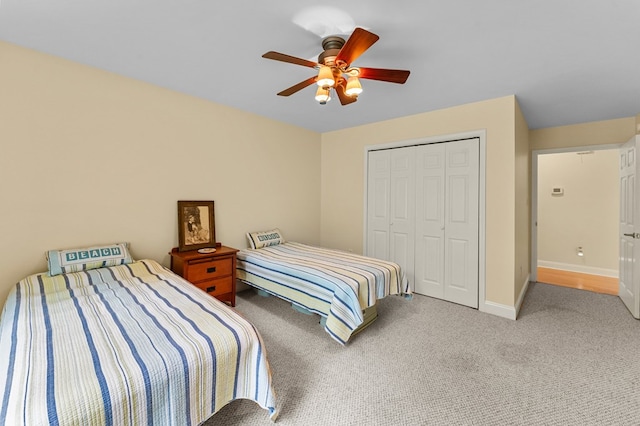 586 Kingscote Dr, Lottsburg, VA 22511 - carpeted bedroom with baseboards, a closet, and a ceiling fan