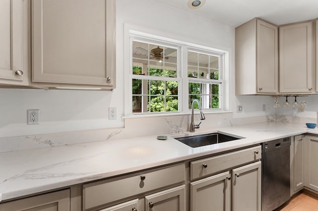 586 Kingscote Dr, Lottsburg, VA 22511 - kitchen with dishwasher, a sink, and light stone counters