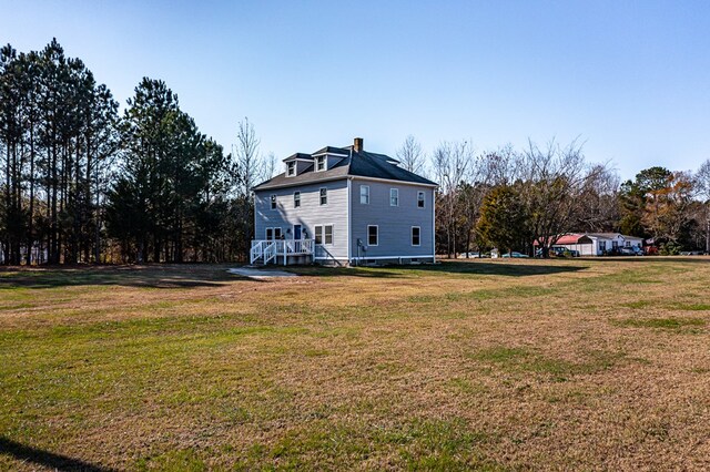 427 Brooks Ln, Callao, VA 22435 - view of home's exterior featuring a lawn