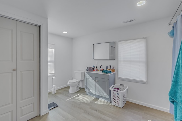 427 Brooks Ln, Callao, VA 22435 - bathroom with hardwood / wood-style floors, vanity, and toilet