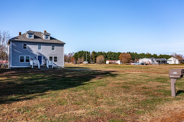 427 Brooks Ln, Callao, VA 22435 - back of house featuring a yard