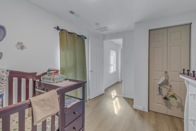 427 Brooks Ln, Callao, VA 22435 - bedroom featuring a closet and light hardwood / wood-style flooring