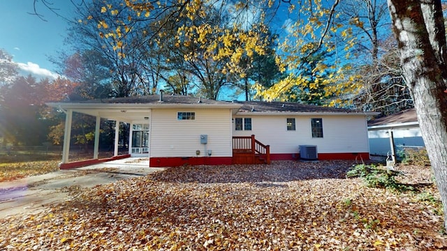 back of house with cooling unit