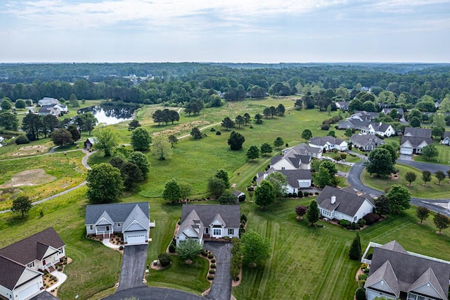 aerial view with a water view and a residential view