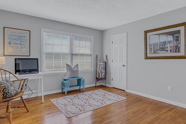 4058 Irvington Rd, Irvington, VA 22480 - sitting room featuring a textured ceiling and light hardwood / wood-style floors