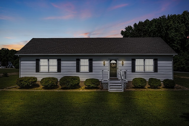 4058 Irvington Rd, Irvington, VA 22480 - ranch-style home with a yard