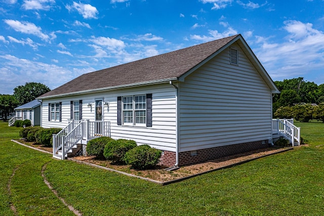 4058 Irvington Rd, Irvington, VA 22480 - view of side of property with a yard