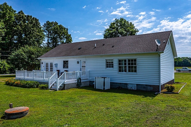 4058 Irvington Rd, Irvington, VA 22480 - rear view of house with a yard and a wooden deck