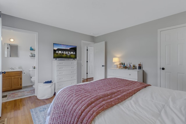 4058 Irvington Rd, Irvington, VA 22480 - bedroom featuring light hardwood / wood-style flooring and ensuite bath