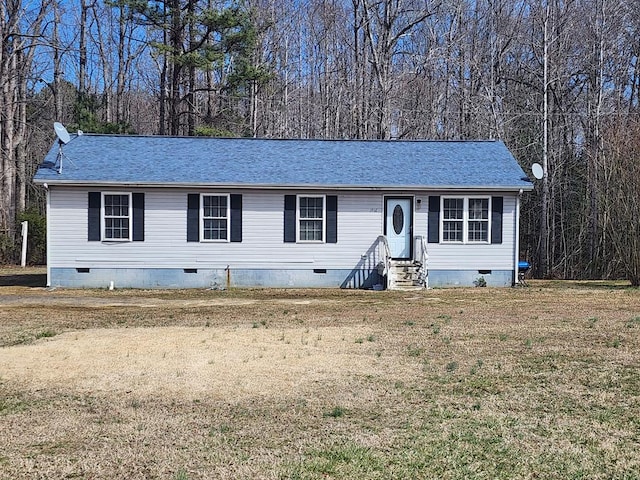 view of front of property with crawl space, entry steps, a front yard, and roof with shingles