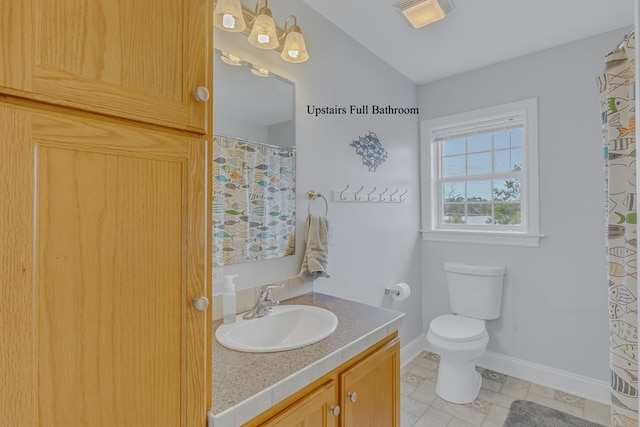 bathroom featuring a shower with curtain, vanity, and toilet