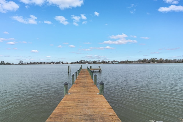 view of dock with a water view