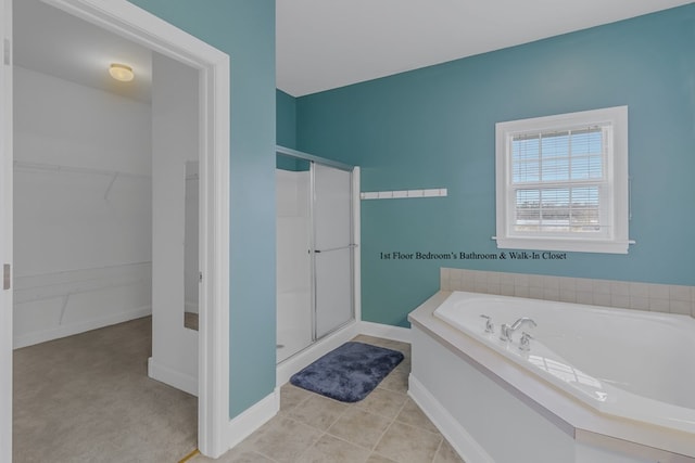 bathroom featuring tile patterned flooring and plus walk in shower