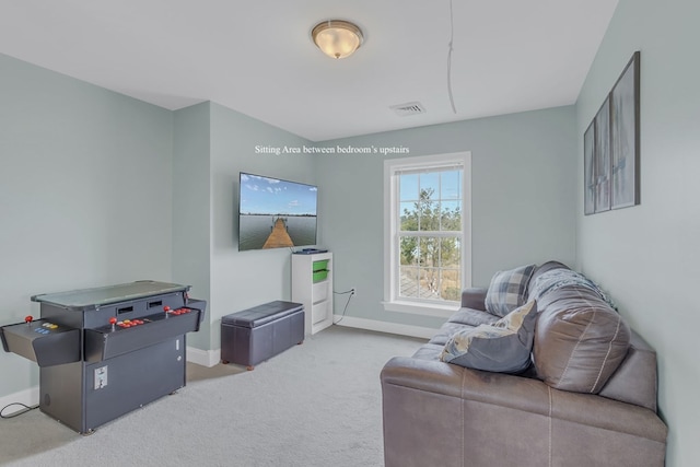 living room with light colored carpet