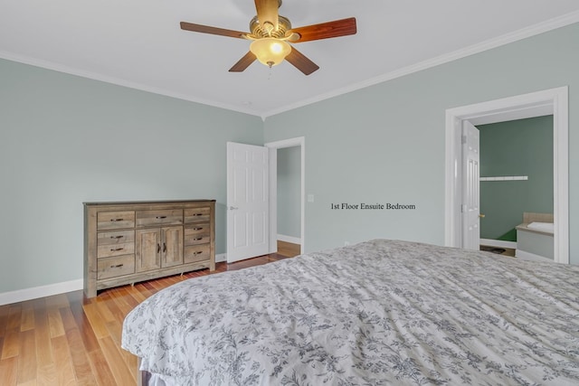 bedroom with ceiling fan, crown molding, light hardwood / wood-style flooring, and ensuite bath