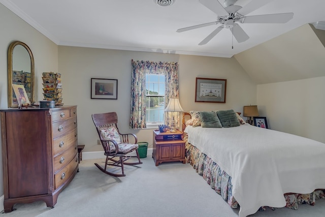 carpeted bedroom with ceiling fan and vaulted ceiling