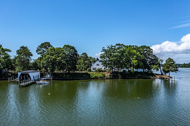 view of water feature with a dock